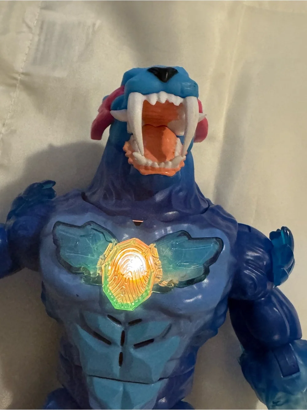 Blue Light-Up Monster Action Figure with Green Chest Glow
